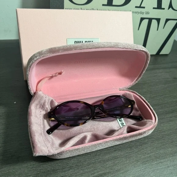 Miu Miu Tortoiseshell Oval Sunglasses with Purple Lenses - Picture 3 of 8